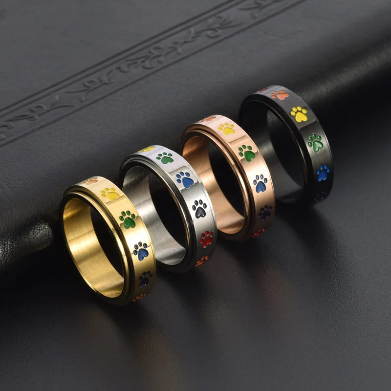 Spinnende Stressreduserende Pote Ring – Regnbuepoter
