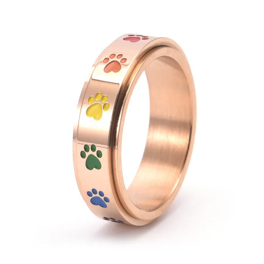 Roterende antistressring med pote-motiv