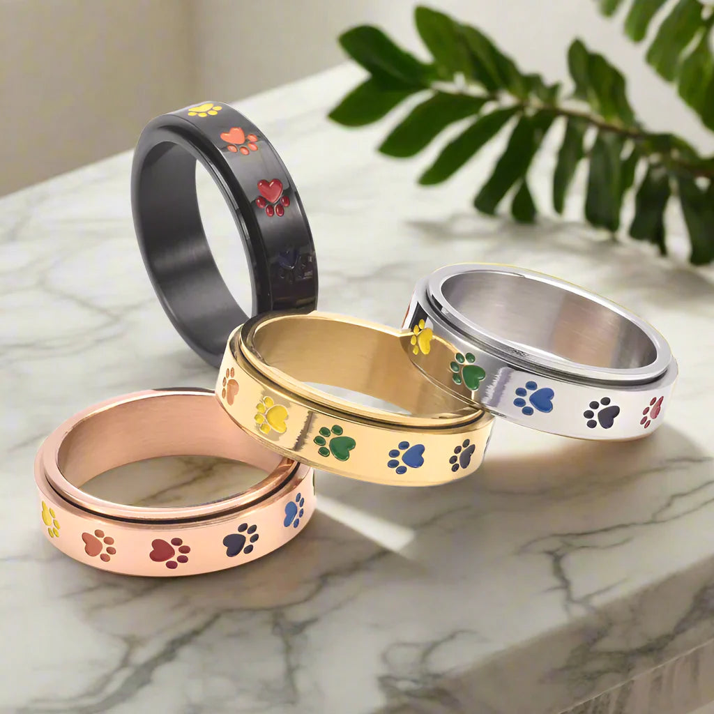 Spinnende Stressreduserende Pote Ring – Regnbuepoter