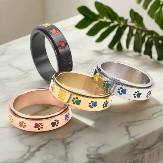 Spinnende Stressreduserende Pote Ring – Regnbuepoter